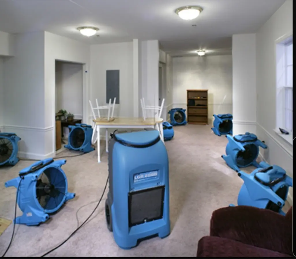 Air movers and dehumidifier setup for Water Damage Restoration in Somers